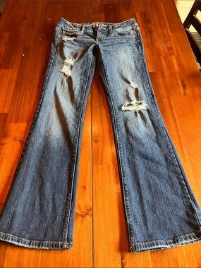 Women's American Eagle Distressed Dark Blue Flared Jeans